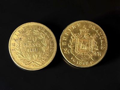 two gold coins, one of which has a crown and the other of which has a crown on it