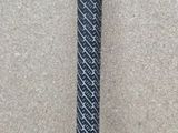 an image of a close up of a black and white baseball bat
