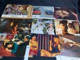 a lot of pictures of people on a bed