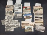 a lot of old postcards that are on the table
