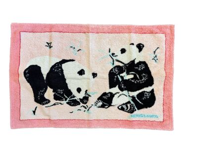 towel with a panda bear and a panda bear on it