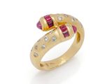 a gold ring with ruby and diamonds