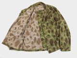 an image of a camouflage jacket on a white background