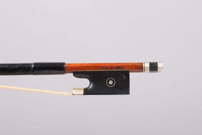 a violin bow with a wooden handle on a white background