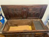 a wooden chest with a wooden top and a wooden bottom