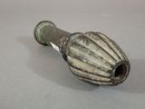a small metal pipe that is sitting on a table