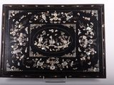 an image of a black and white tray with flowers and birds
