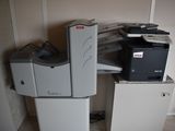 a photo of a printer and a printer scanner in a room