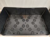 a close up of a plastic tray with holes in it