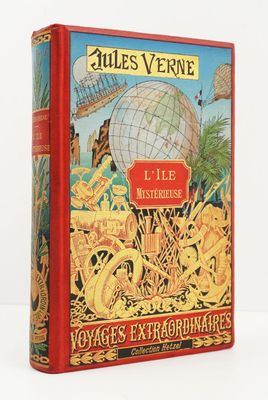 un vieux livre rouge sur lequel figure l'image d'un globe terrestre