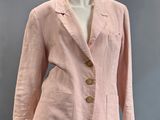 a picture of a pink jacket on a mannequin mannequin