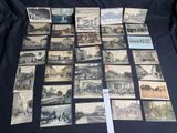 a lot of old postcards that are on the table