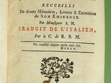 un livre ouvert sur lequel figure l'image d'un arbre