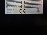 a close up of a sign on the side of a microwave