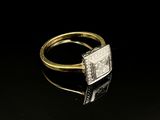 une bague en or 18k et diamants