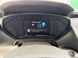 the dashboard of a car with a digital display in the center