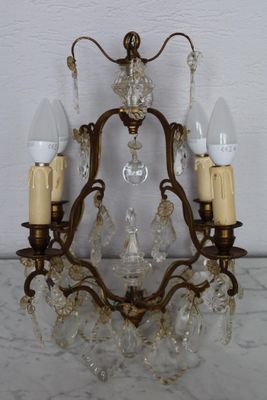 Lustre de forme corbeille éclairant à quatre bras de lumière…