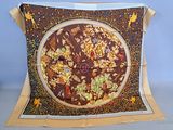 a picture of a pizza on a table cloth