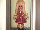 a picture of a painting of a girl with bananas in her hand