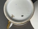 a close up of a coffee cup on a table