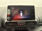 a picture of a car dashboard with a car on the screen