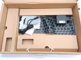 a box with a keyboard and a mouse inside of it