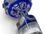 pair of blue glass vases on a white background