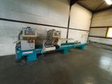 two machines that are sitting inside of a building