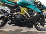 a motorcycle that is parked in a parking lot