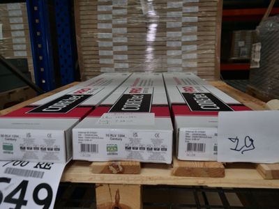 several boxes are stacked on a pallet in a warehouse