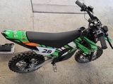 a dirt bike that is sitting on the ground