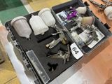 a tool box with tools on a table in a room