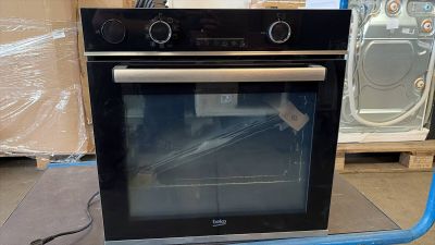 a oven that is sitting in the middle of the floor