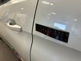 a sticker on the door of a white car