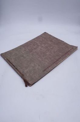 leather notebook cover with stitching on the front of it