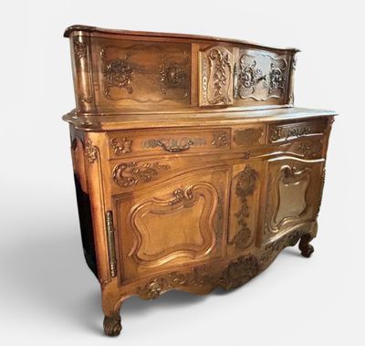 an image of a wooden cabinet with a mirror on top of it