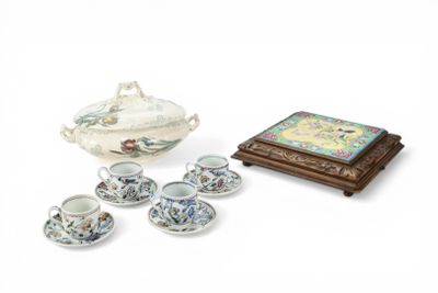 a tea set with a tray and cups and saucers