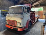 a truck that is parked inside of a building
