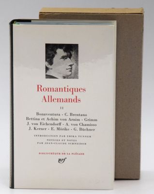 an old book with a picture of a man in a suit and tie