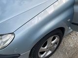 a picture of a car that is parked on the side of the road