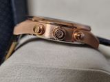 a close up of a watch on a person ' s arm