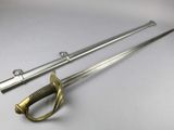 two swords that are laying on a white surface