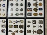 a lot of badges on display on the floor