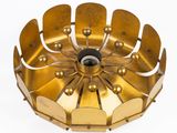 a gold plated ceiling light that has a flower design on it