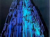 un immeuble très haut illuminé de lumières bleues