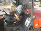 a close up of a tractor with a seat on it