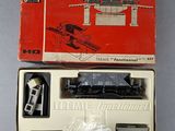 a box with a train set in it on a table