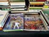 a lot of books that are on a table