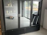 a large sliding glass door in the corner of a room