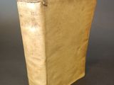an old book that is sitting on a table